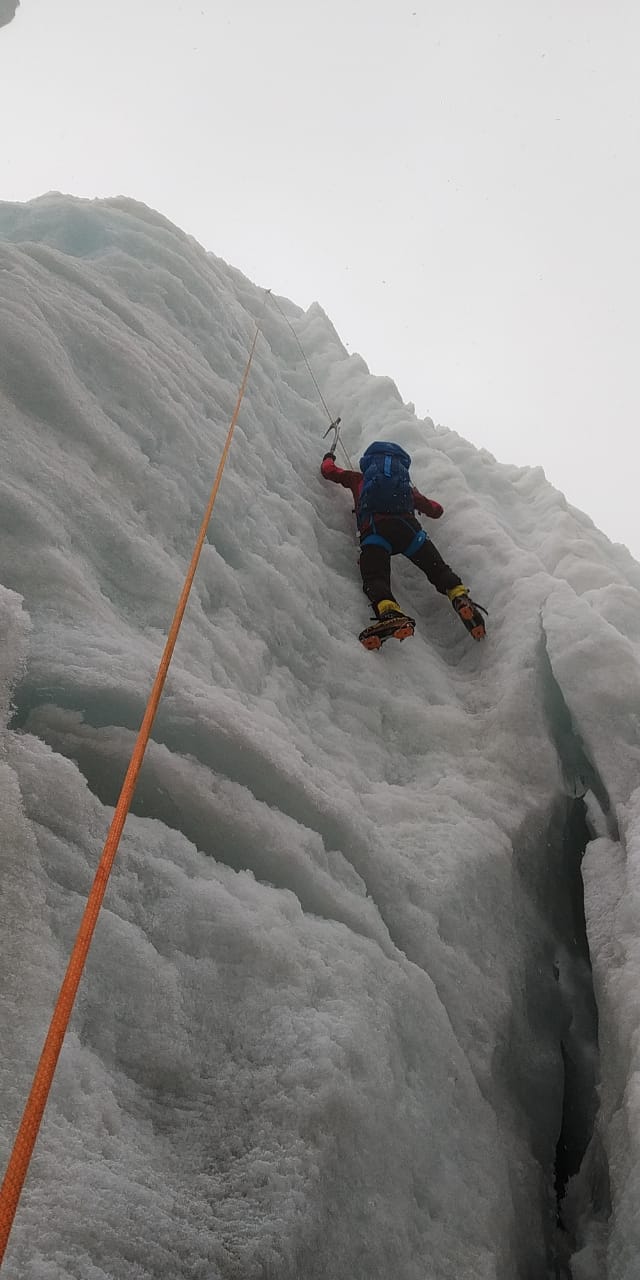 Climbing vertical ice on the glacier